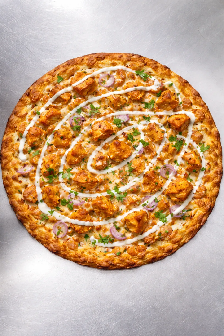 Butter chicken pizza at Tasty Pizza and Indian Cuisine in Beaumont, AB